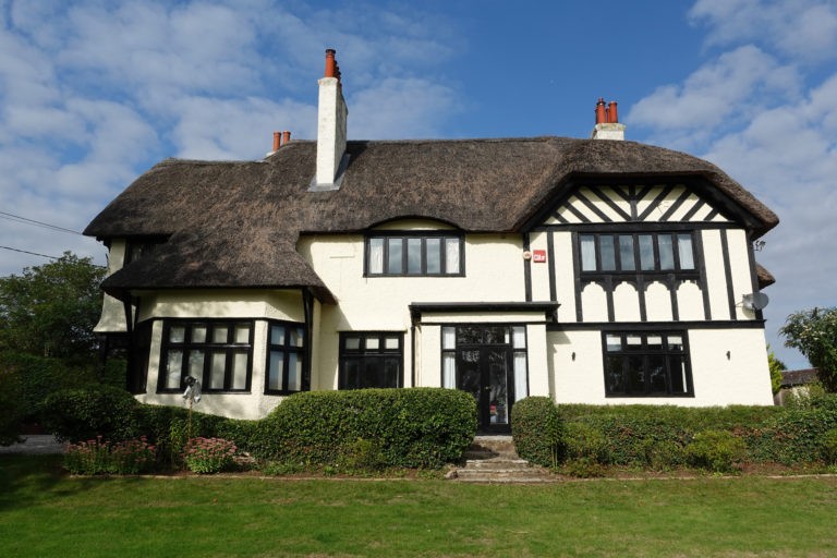 awc-english-cottage-countryside-thatched-roof-rendered